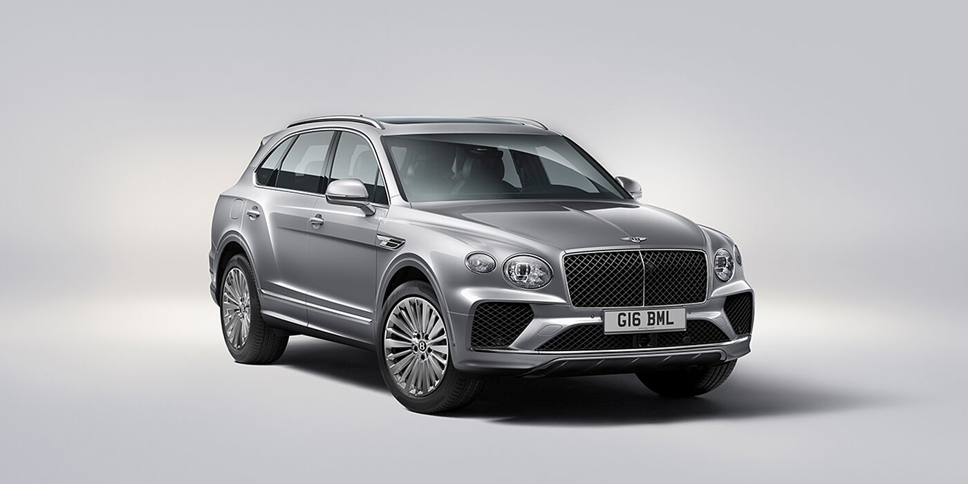 Bentley Auckland Bentley Bentayga luxury SUV front three quarter view in Moonbeam paint with matrix grille and 21″ 5 spoke painted wheels