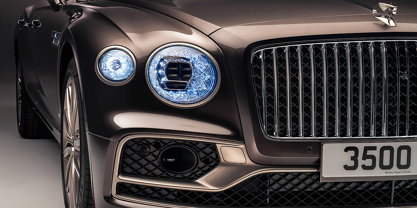 Bentley Auckland Bentley Flying Spur Odyssean sedan front grille and illuminated led lamps with Brodgar brown paint