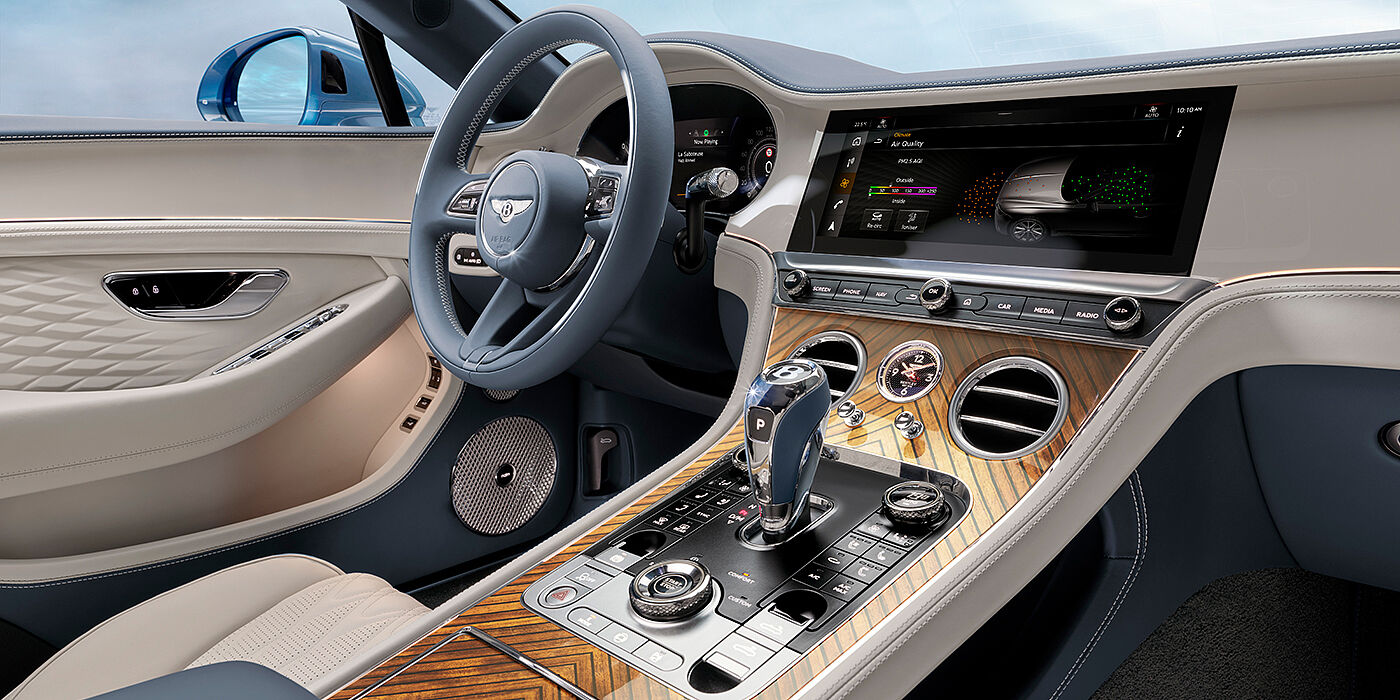 Bentley Auckland New Bentley Continental GTC Azure convertible interior front cabin view with Linen and Brunel hides and Piano Linen by Mulliner veneer featuring centre console and centre MMI screen