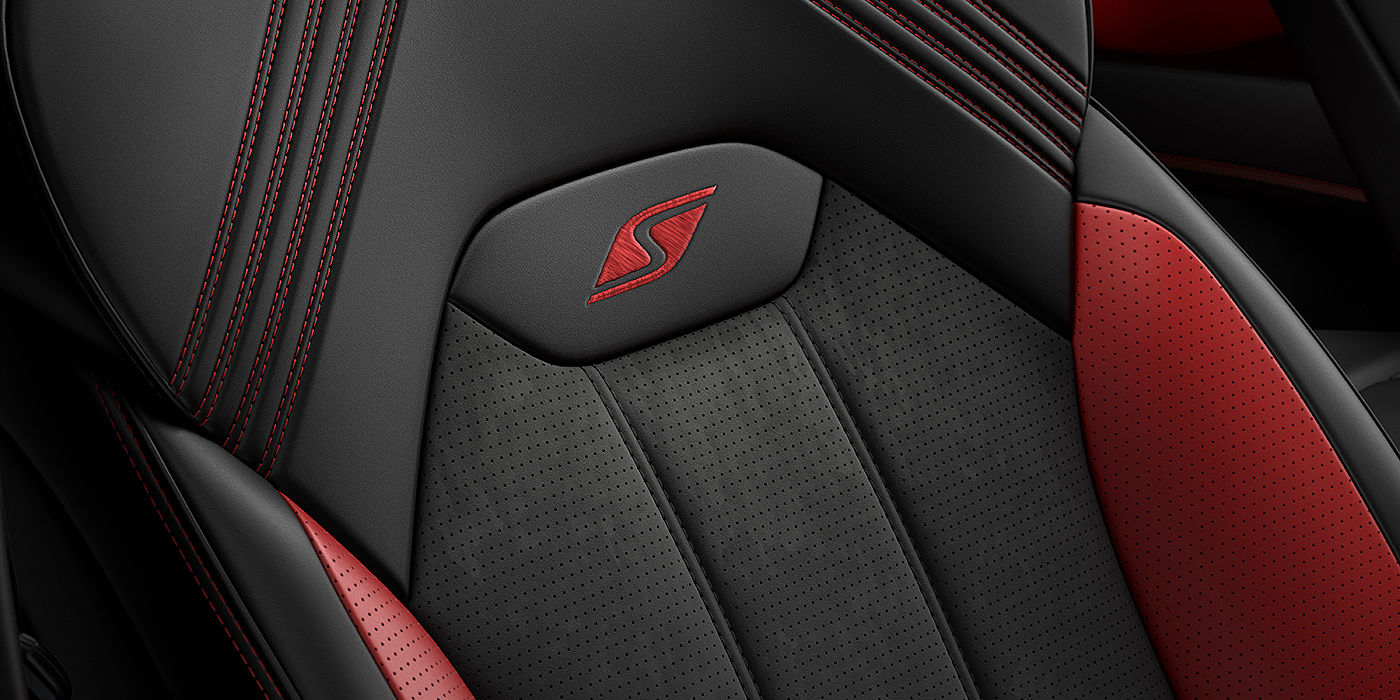 Bentley Auckland Bentley Bentayga S seat with detailed red Hotspur stitching and black Beluga coloured hide. 