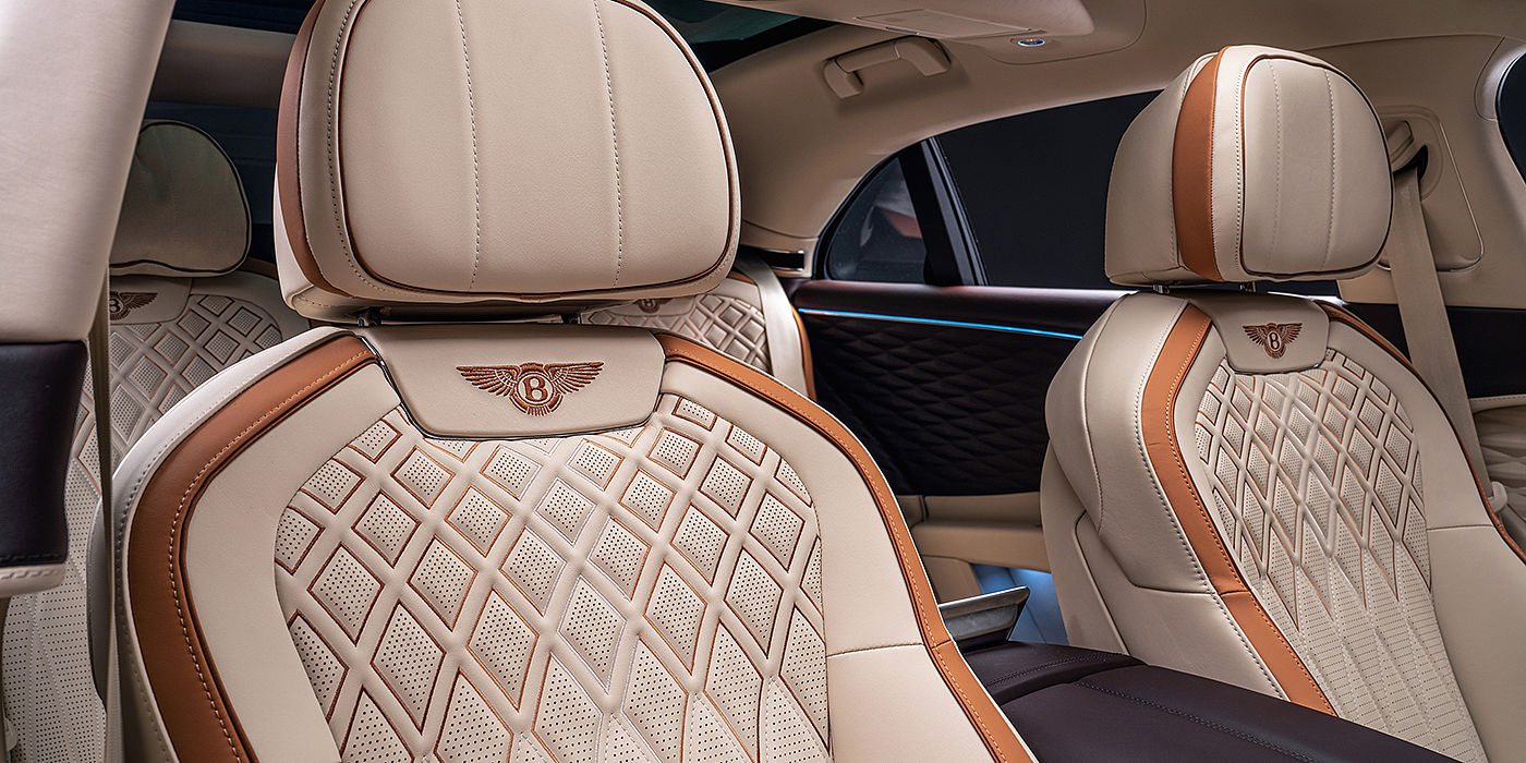 Bentley Auckland Bentley Flying Spur Odyssean sedan rear seat detail with Diamond quilting and Linen and Burnt Oak hides