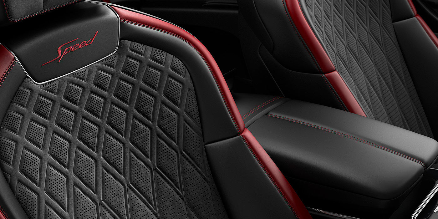 Bentley Auckland Bentley Flying Spur Speed sedan seat stitching detail in Beluga black and Cricket Ball red hide
