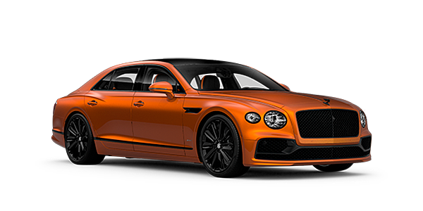 Bentley Auckland Bentley Flying Spur Speed front side angled view in Orange Flame coloured exterior. 