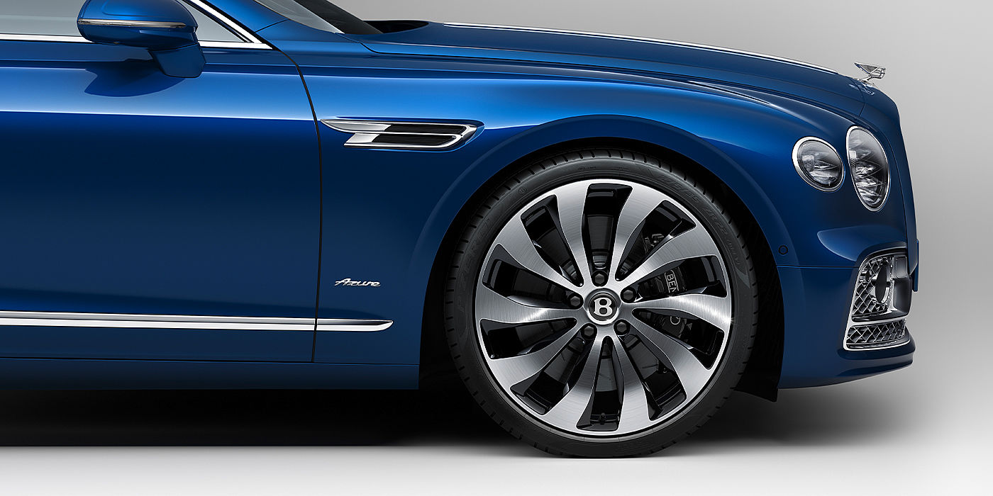 Bentley Auckland Bentley Flying Spur Azure sedan side close up in Sequin Blue paint with Azure badge